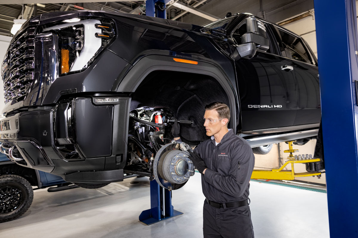 Tech in Service Center Working on brake repairs